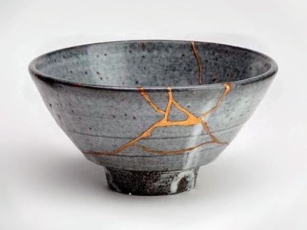 A broken bowl, fixed with gold. Broken, yet now made more beautiful. Japanese kintsugi.